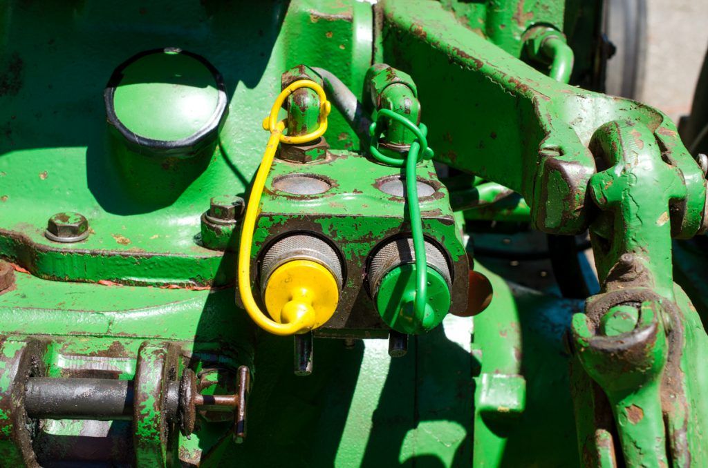 Photo showing John Deere 1640/2040 Breakaway Coupler reinstalled on back of tractor.
