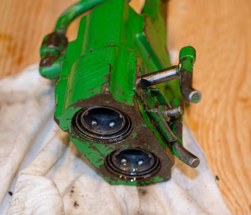 Photo showing removal of the lever handle on a John Deere 1640/2040 Breakaway Coupler.