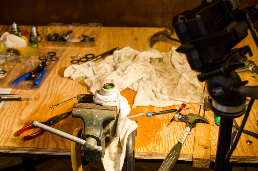 Photo showing setup of removing the snap ring on the coupler of a John Deere 1640/2040 Breakaway Coupler.